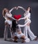 Trio of beautiful go-go dancers posing as cupids