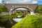 A trio of bridges over the Chesterfield canal on the outskirts of Worksop in Nottinghamshire, UK