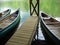 Trio of canoes await in boathouse in North Carolina mountains