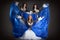 Trio of cute girls in traditional dance costumes