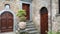 A trio of doors in a Tuscan hill town