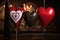 a trio of heart-shaped balloons with various cultural elements