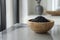 A trio of images showcasing artisan black lava salt in decorative bowls against calm