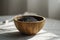 trio of images showcasing artisan black lava salt in decorative bowls against calm, homely backdrops