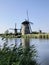 a trio of windmills in the Netherlands