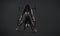 Trio of young female acrobats posing on a cube suspended at a height. Aerial gymnasts perform in studio against dark