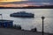 The trip motor ship on the Volga river in autumn evening. Samara city, Russia.