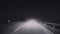 A trip on a night rural road in a fog