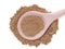 Triphala organic powder in wooden spoon