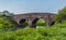 A triple arch bridge over the River Rother at Bodiam, Sussex