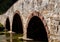 Triple arch stone bridge