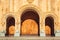 Triple church arched wooden door. Fretted arches. Exquisite carving. Holy Trinity Cathedral Tsminda Sameba in Tbilisi, Georgia. Re