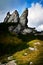 A triple peak in a limestone rocky town