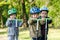 Triplets boys, compete in riding scooters