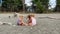 Triplets sisters on the beach