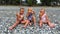 Triplets sisters on the beach