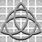 Triquetra on spotted background in black and white