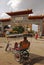 Trishaw in front of the main gate entrance of Havana Chinatown in Cuba