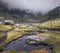 Tristaina Lakes Embraced by Mist in Andorra