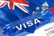 Tristan da Cunha Visa in passport. USA immigration Visa for Tristan da Cunha citizens focusing on word VISA. Travel Tristan da