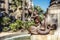 Tritons spouting water in a foutain below the Galceran Marquet monument in Barcelona, Catalonia, Spain