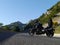 Triumph Rocket 3 motorcycle on tarmac road leading to mountians