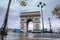 Triumphal arch. Arc de triomphe. View of Place Charles de Gaulle. Famous touristic architecture landmark in rainy day. Long expos