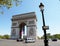 Triumphal arch in Paris on open urban nature