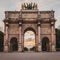 Triumphal Arch of the Tuileries Gardens at sunset in Paris
