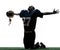 Triumphant american football player man silhouette