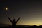 Triumphant businessman greeting a new day standing outdoors