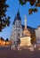 Trnava - The gothic Saint Nicholas church and baroque column of st. Joseph