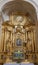 TRNAVA, SLOVAKIA - MARCH 3, 2014: The side baroque altar in Jesuits church from 18. cent..