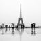 Trocadero square of a rainy day with Eiffel tower background