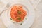 Trofie italian pasta with tuna fish sauce goumet food on white table