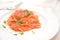 Trofie italian pasta with tuna fish sauce goumet food on white table