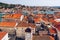 Trogir in Croatia, town panoramic view with red roof tiles, Croatian tourist destination. Trogir town sea front view, Croatia.