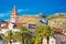 Trogir landmarks and mountain cliffs background
