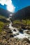 Trollstigen or Trolls Path is a serpentine mountain road in Norway