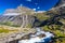 Trollstigen or Trolls Path is a serpentine mountain road in Norway