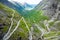 Trollstigen or Trolls Path is a serpentine mountain road in Rauma Municipality in Norway