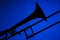 Trombone Silhouette Isolated on Blue