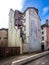 Trompe l `oeill on side of unusual building with outside staircase in Chalon sur Saone, Burgundy, France