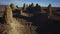 Trona Pinnacles Rock Formation in Mojave Desert Near Death Valley California Daytime Aerial Shot Forward