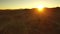 Trona Pinnacles Sunset in Mojave Desert Near Death Valley California Aerial Shot Backward