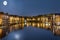 Trondheim and Nidelva River at 2 am in the night with full moon, Norway