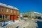 TRONDHEIM, NORWAY - APRIL 04, 2018: Traditional Scandinavian wooden buildings stand along old street in Trondheim