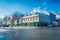 TRONDHEIM, NORWAY - APRIL 04, 2018: Traditional Scandinavian wooden buildings stand along old street in Trondheim