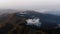 Troodos mountain scenery with low clouds at sundown. Cyprus