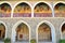 TROODOS MOUNTAINS, CYPRUS â€“ NOVEMBER 18, 2015: The arcades inside Kykkos Monastery with colorful mosaics